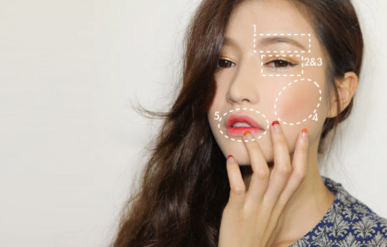 韓妝特點包括：平直眉、Puppy Eye line、臥蠶、橙胭脂及「咬唇」。